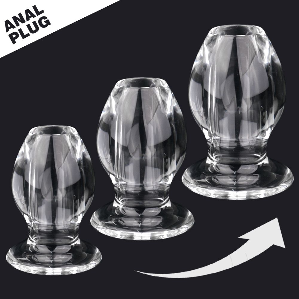 Drei transparente Anal-Plugs in verschiedenen Größen. Produktname: ANAL PLUG. Pfeil zeigt Richtung.
