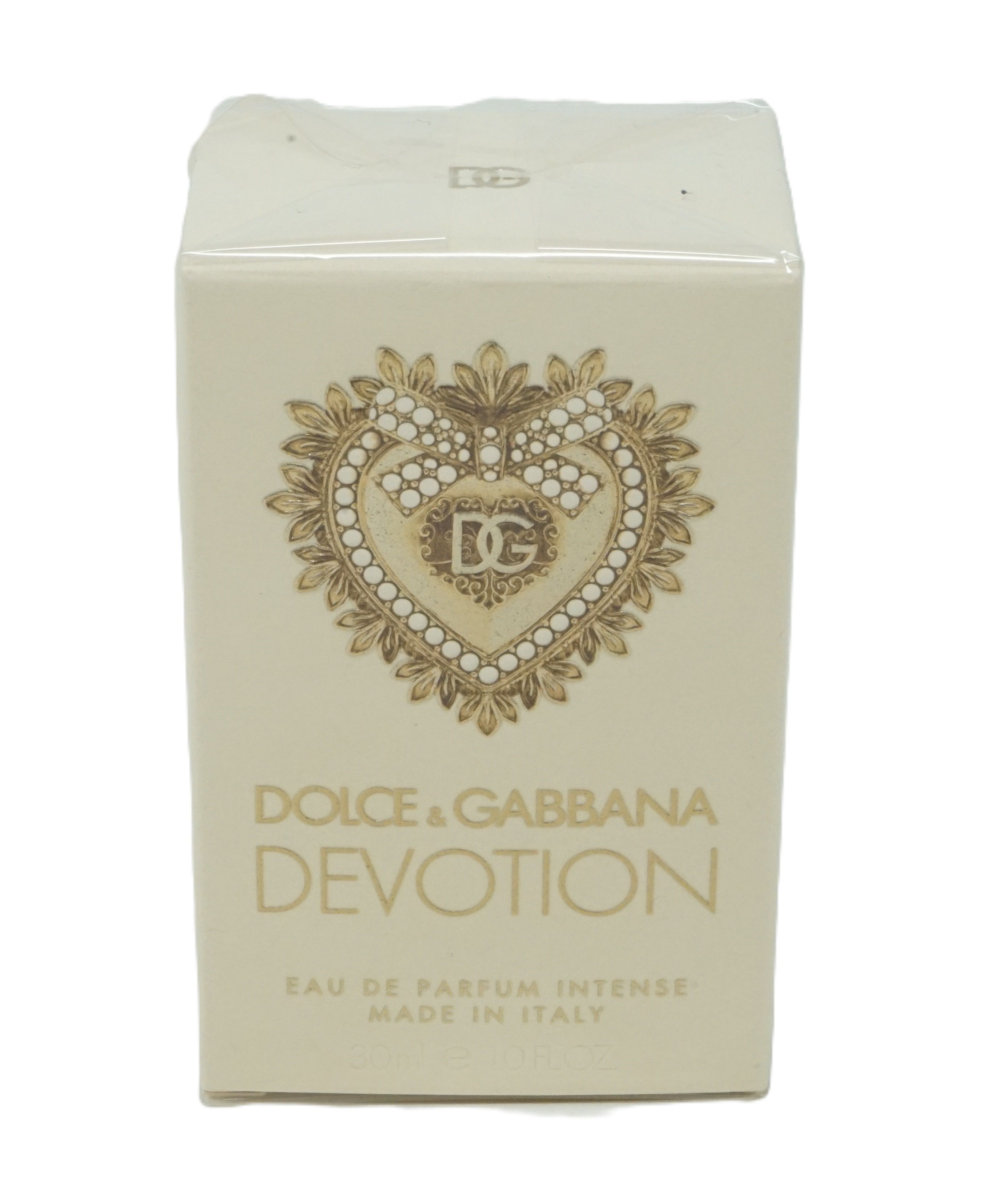 Parfümverpackung. Aufschrift: Dolce & Gabbana Devotion Eau de Parfum Intense. Herz-Dekor. Made in Italy.