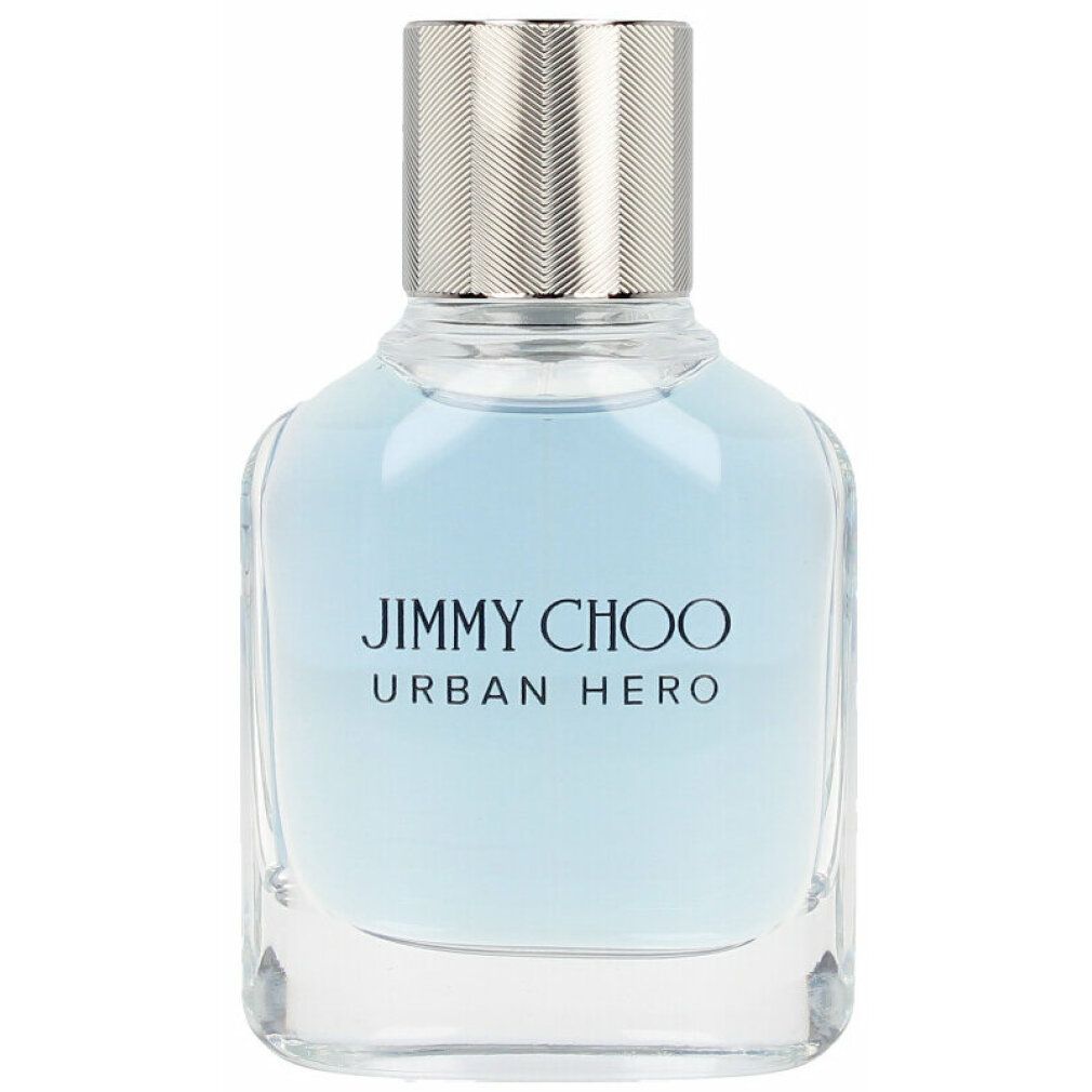 Glasflakon mit silbernem Deckel. Aufschrift: JIMMY CHOO URBAN HERO. Hellblaue Flüssigkeit im Inneren.