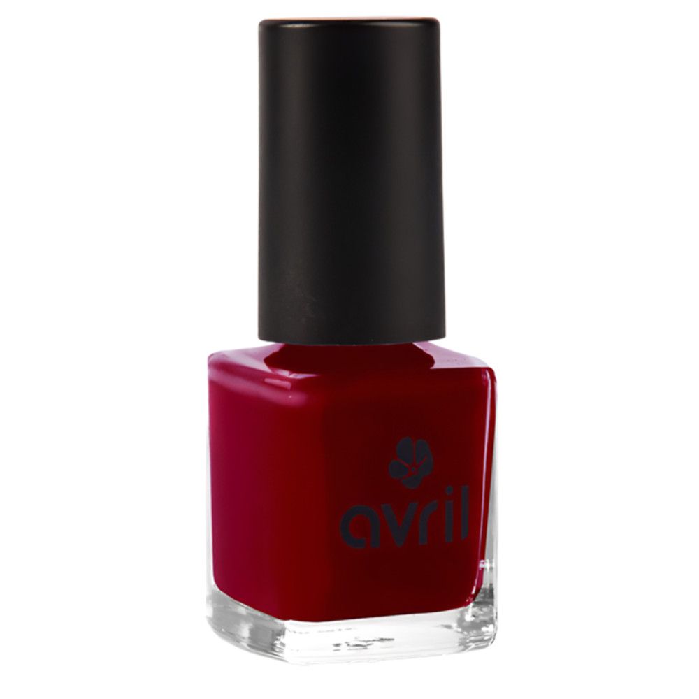 Rote Nagellackflasche mit schwarzem Deckel. Quadratische Form, Produktname sichtbar.