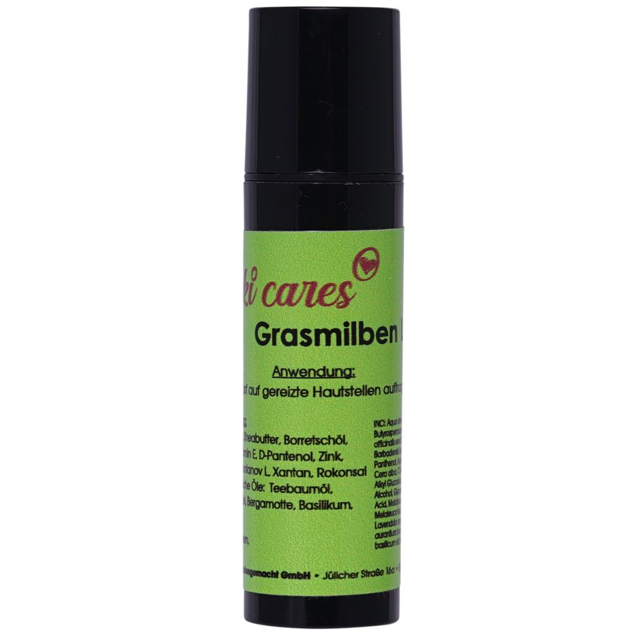 Grün-schwarze Flasche mit "Yuki cares Grasmilben"-Etikett. Text: Anwendung auf gereizte Hautstellen.
