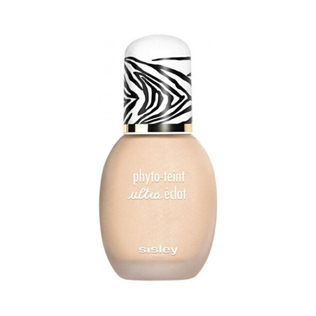 Sisley Phyto-Teint Ultra Eclat Foundation. Flasche mit Zebra-Muster-Kappe. Text: oil free - long lasting foundation.