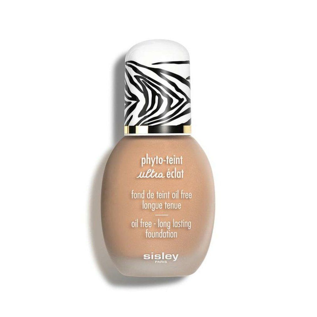 Sisley Phyto-Teint Ultra Eclat Foundation. Flasche mit Zebra-Muster-Kappe. Text: Oil free - long lasting foundation.