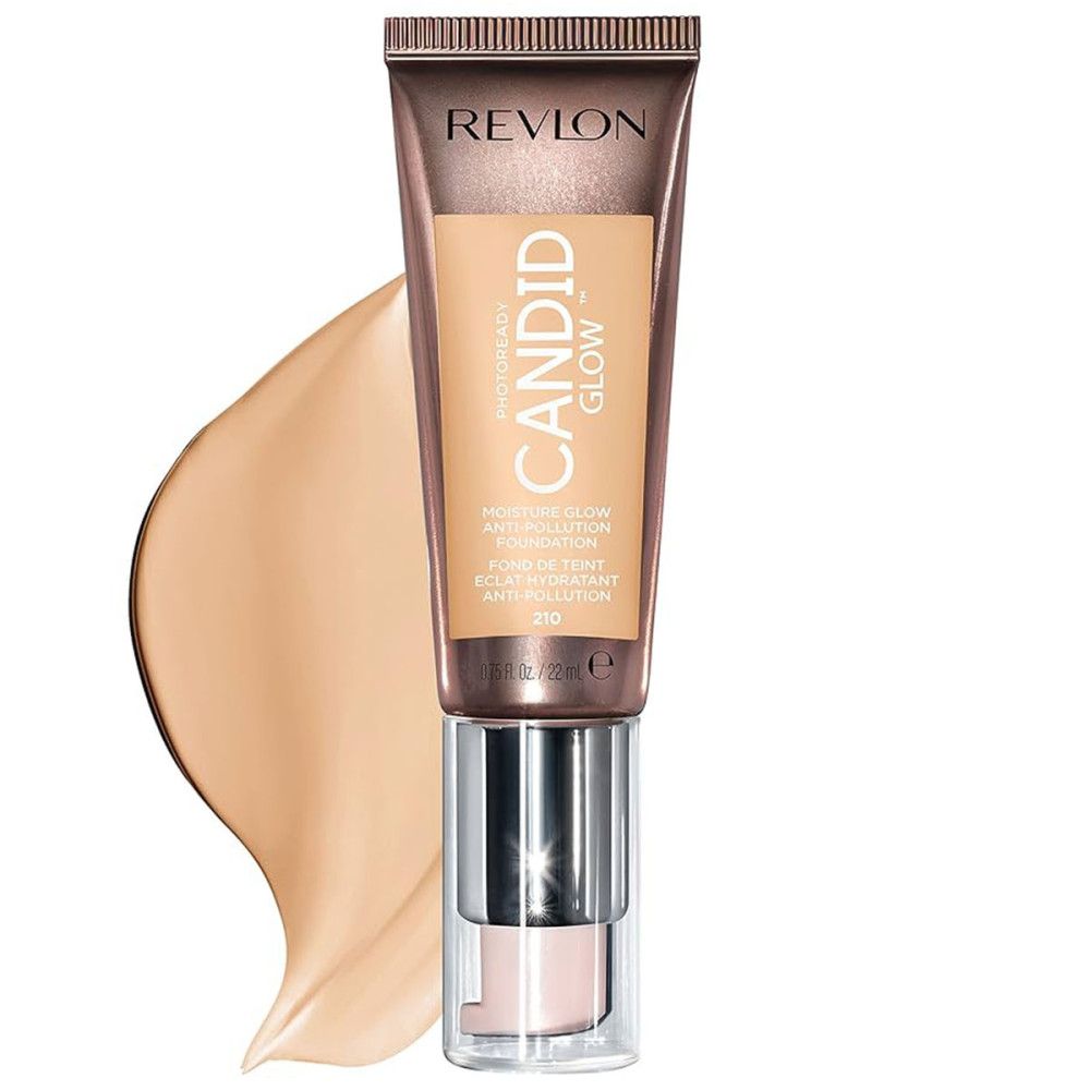 Revlon Candid Glow Foundation. Tube mit braunem Deckel und silberner Pumpe. Farbklecks daneben. Text: Candid Glow, Anti-Verschmutzung.