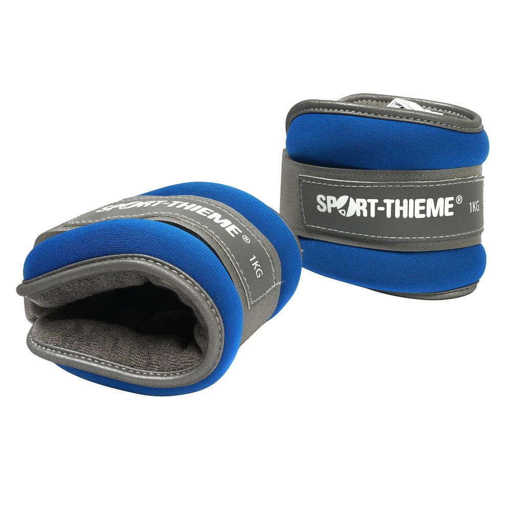 Zwei blaue Sport-Thieme Gewichtsmanschetten. Graue Klettverschlüsse mit Logo und 1 KG. Neopren-Material.