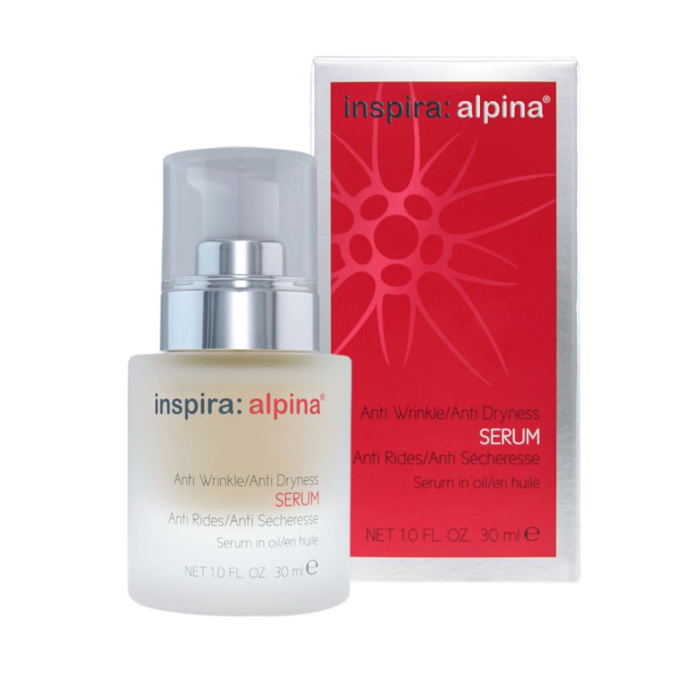 Serumflasche und Verpackung. Aufschrift: inspira: alpina, Anti Wrinkle/Anti Dryness Serum. Flasche mit Sprühkopf, Verpackung rot-weiß.