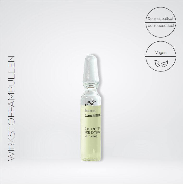 Einzelne Ampulle CNC Immun Concentrate. Klare Glasampulle mit gelblicher Flüssigkeit. Beschriftung und Verschluss. Vegan-Siegel.