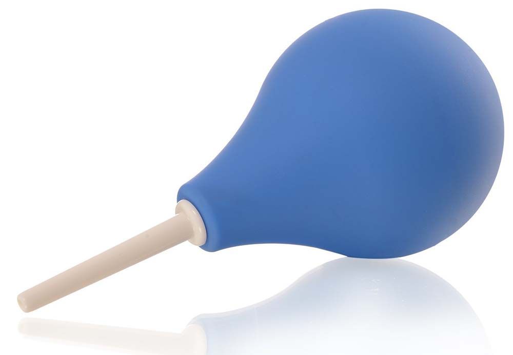 Blaue Dusche mit beigem Applikator. Birnenförmiger Körper, Applikator eingesetzt.