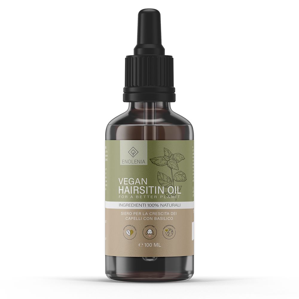 Flacone di vetro marrone con contagocce nero. Etichetta con "Enolenia", "Vegan Hairsitin Oil" e ingredienti.