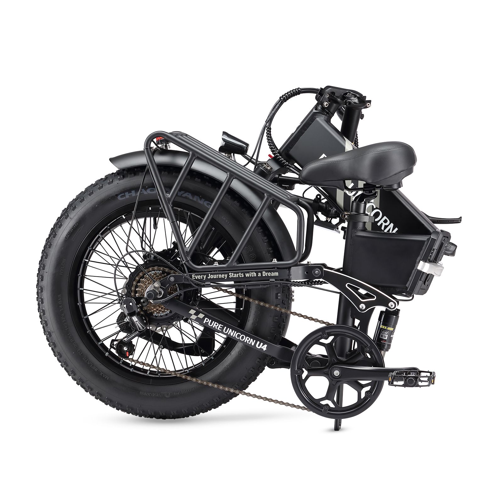 Gefaltetes schwarzes E-Bike mit breiten Reifen. Marke PURE UNICORN. Gepäckträger und Sattel.