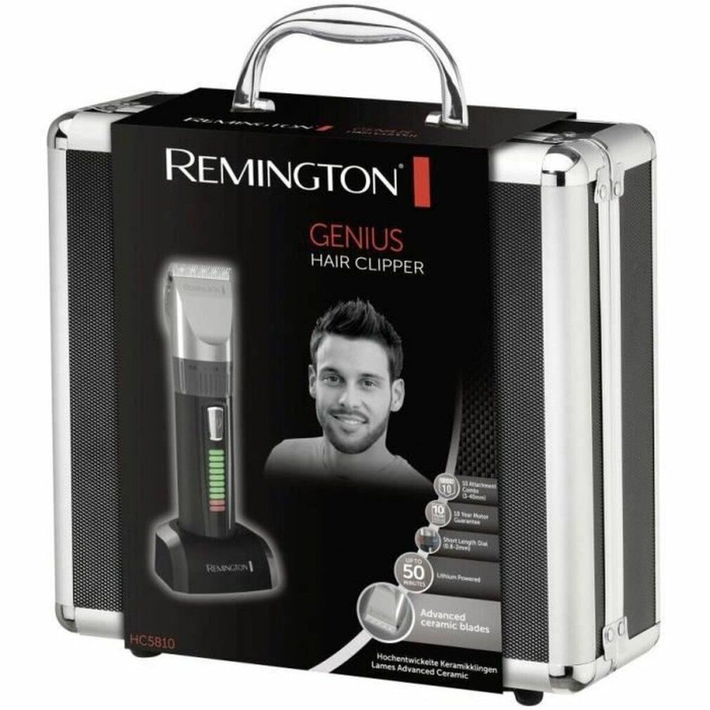 Haarschneider-Set in silberfarbener Transportbox. Produktname: Remington Genius Hair Clipper. Abbildung des Produkts auf der Box.