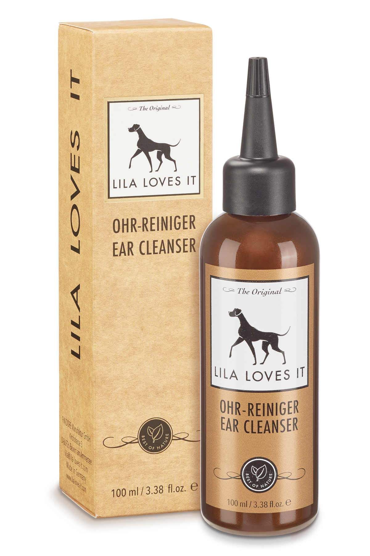 Braune Flasche und Karton mit Etikett. Aufschrift: LILA LOVES IT Ohr-Reiniger. Logo: Hund. 100 ml.