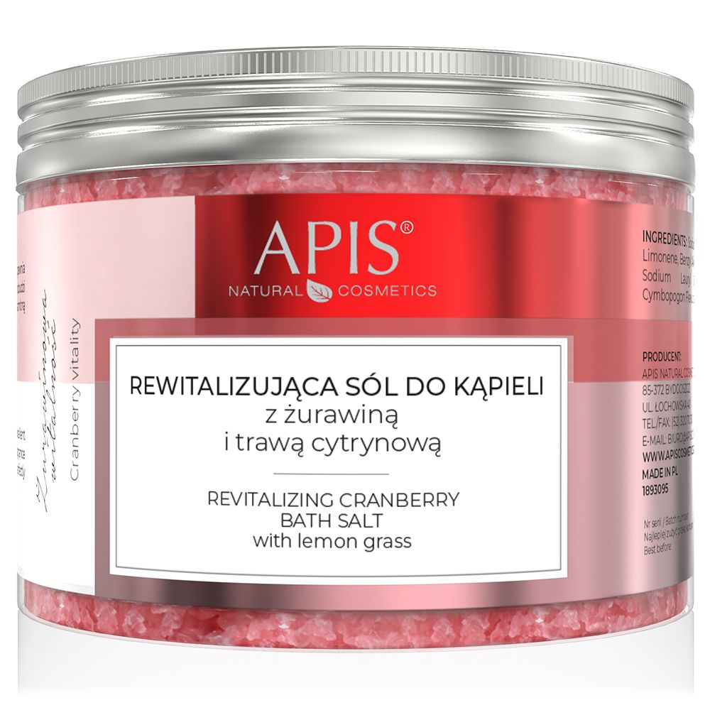 Rotes Badesalz in einem transparenten Behälter mit silbernem Deckel. Etikett mit Produktnamen und Marke APIS.