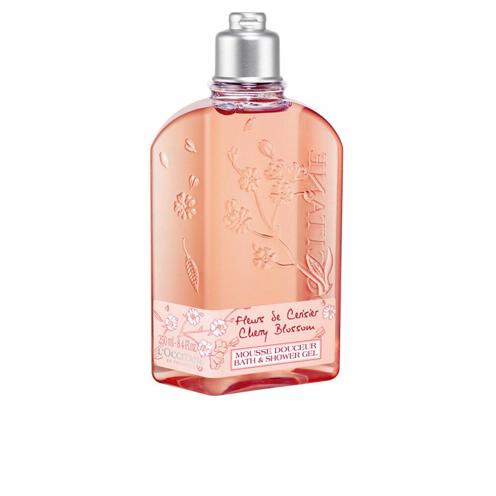 Rosa Duschgelflasche mit Kirschblüten-Design. Text: "Fleur de Cerisier Cherry Blossom". Marke sichtbar.