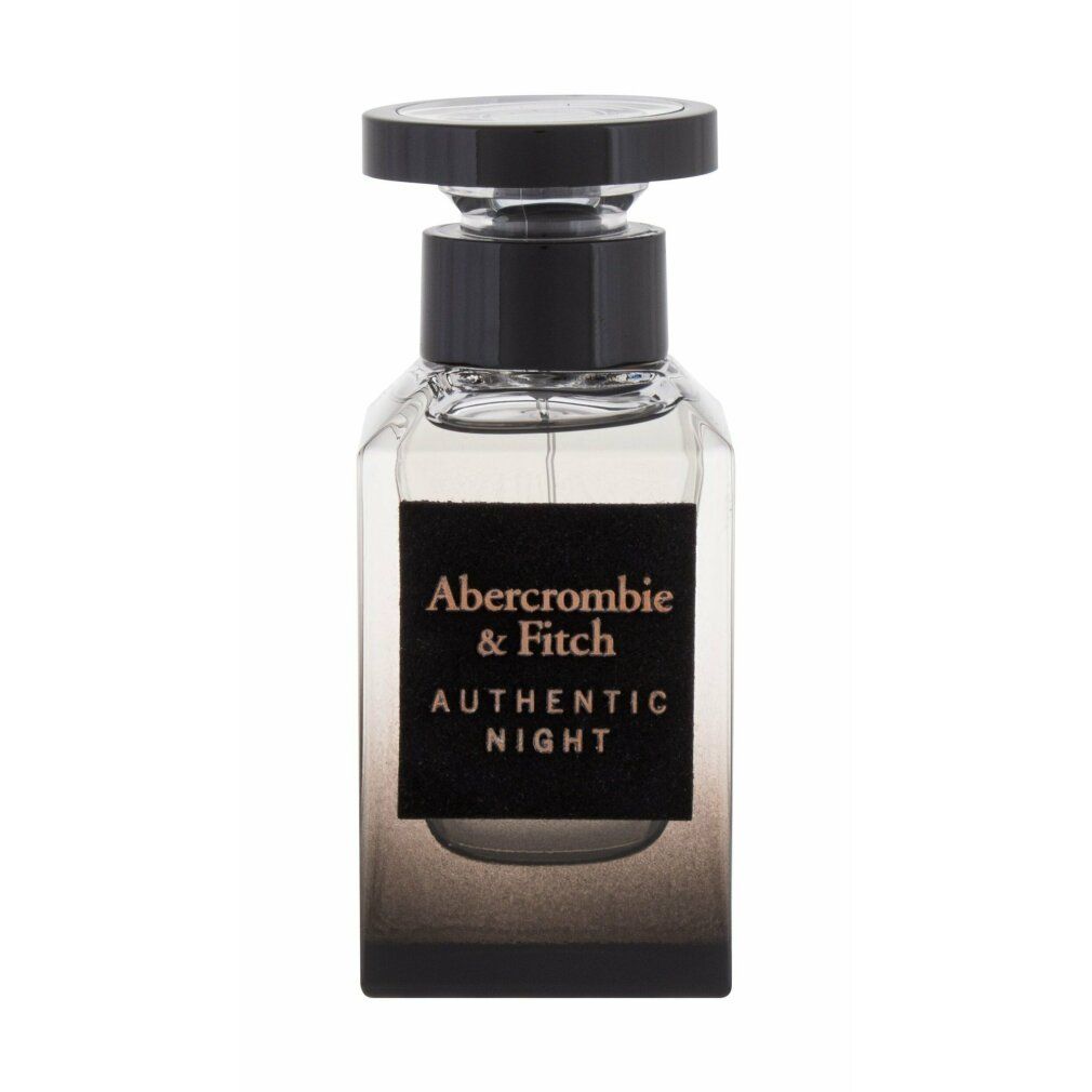 Parfümflakon mit schwarzem Verschluss und Etikett. Aufschrift: Abercrombie & Fitch AUTHENTIC NIGHT.