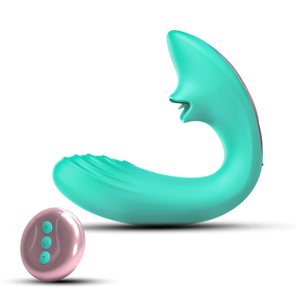 Türkisfarbener Vibrator mit rosa Akzenten und Fernbedienung. Ergonomische Form mit geriffelter Oberfläche.