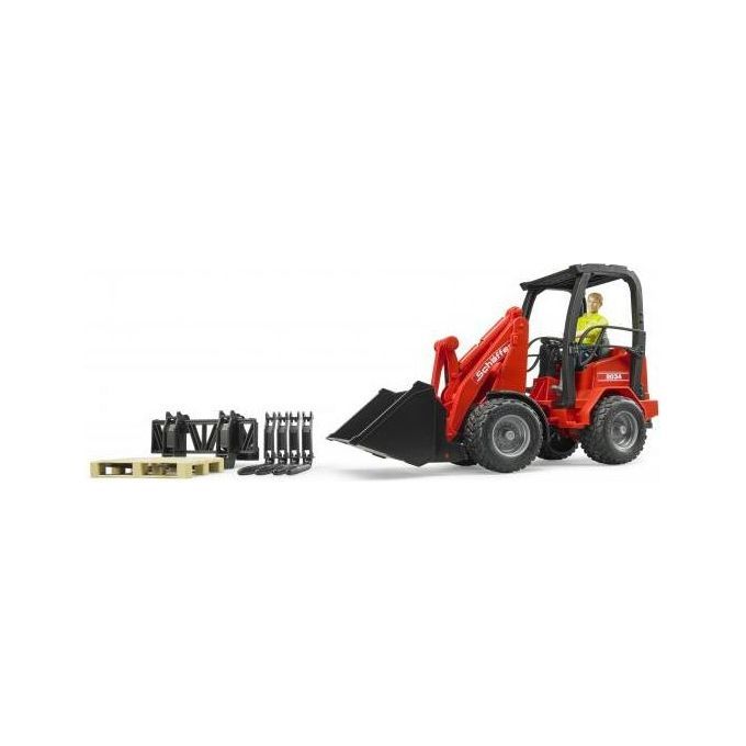 Caricatore gommato BRUDER rosso con accessori. Include forche, pallet e una figura. Benna nera. Logo Bruder non visibile.