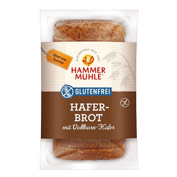 Verpacktes glutenfreies Haferbrot von Hammermühle. Braunes Brot in Folie, mit Label "glutenfrei" und "Haferbrot".