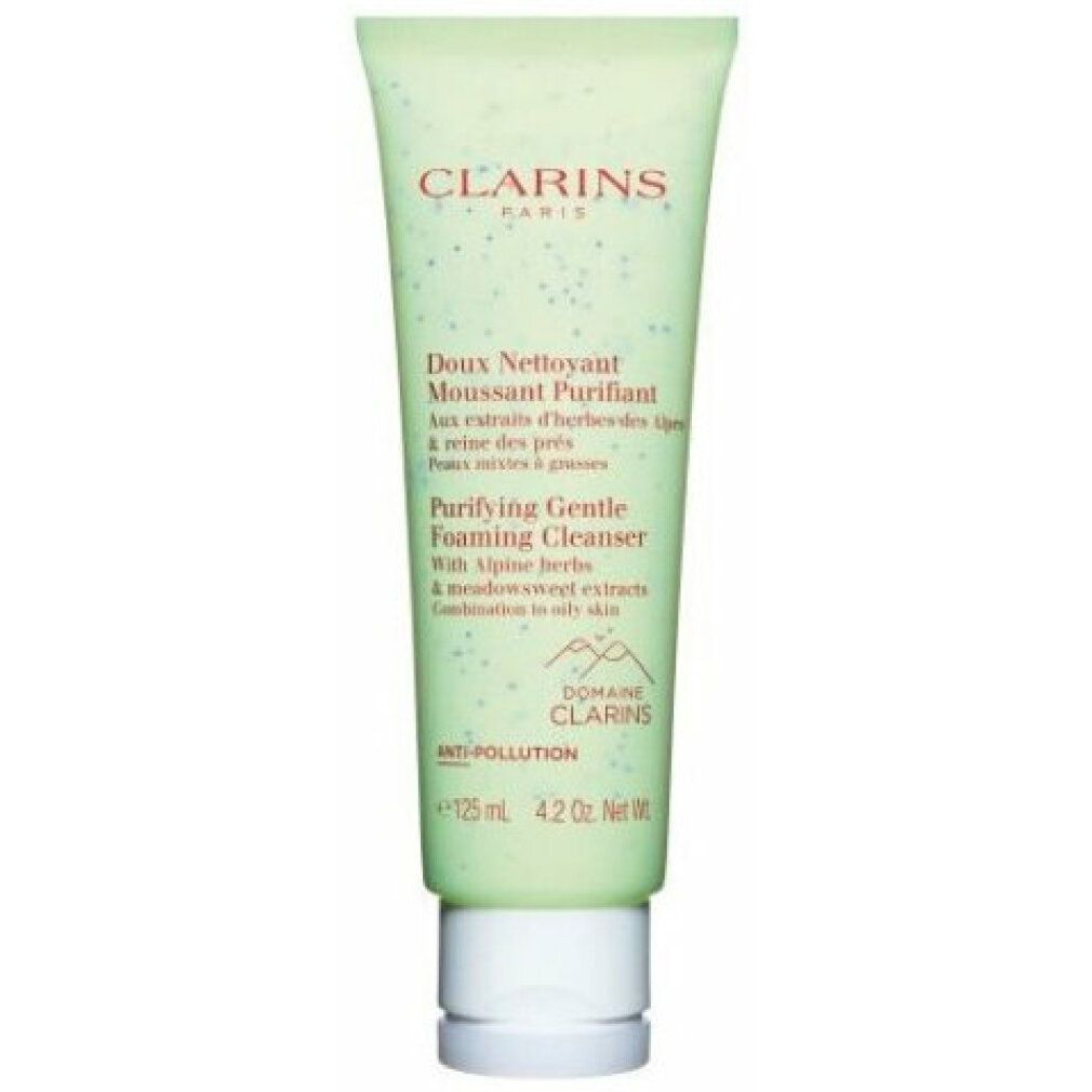 Grüne Tube mit Produkttext. Marke Clarins. Aufschrift: Doux Nettoyant Moussant Purifiant. Mit Alpenkräutern und Wiesensüß-Extrakten.