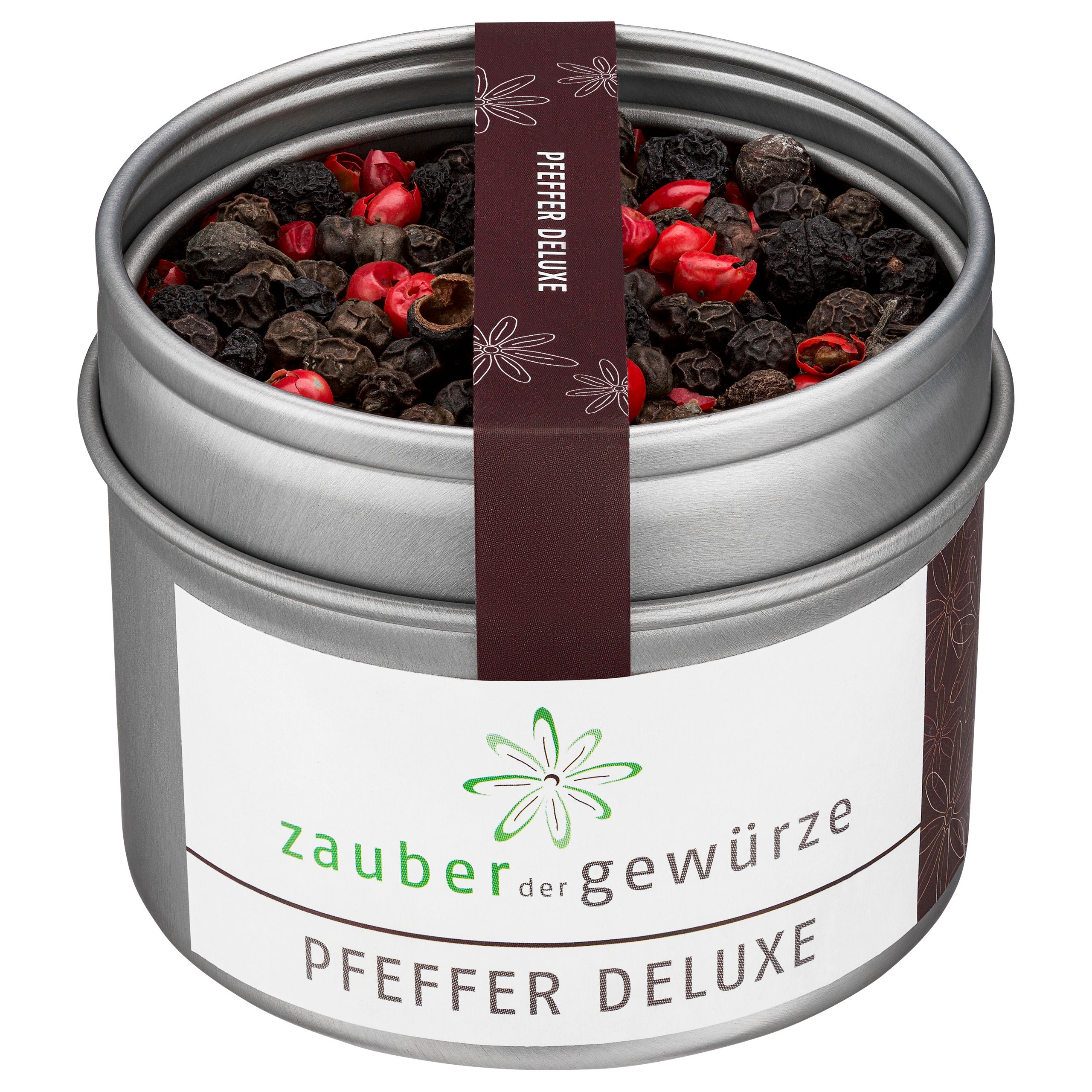 Runde Dose mit Pfefferkörnern. Aufschrift: Zauber der Gewürze Pfeffer deluxe. Braunes Band mit Aufschrift.