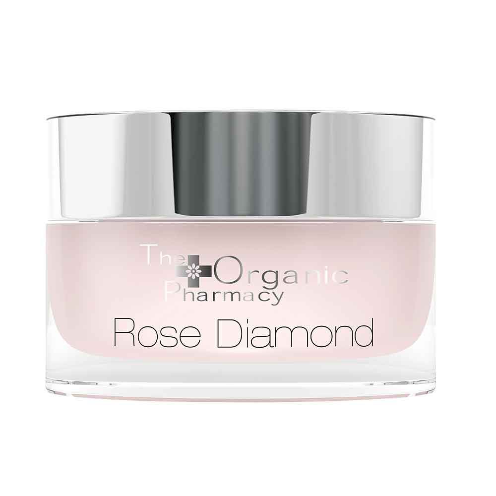 Creme-Tiegel mit silberfarbenem Deckel. Auf dem rosafarbenen Glas steht "The Organic Pharmacy Rose Diamond".