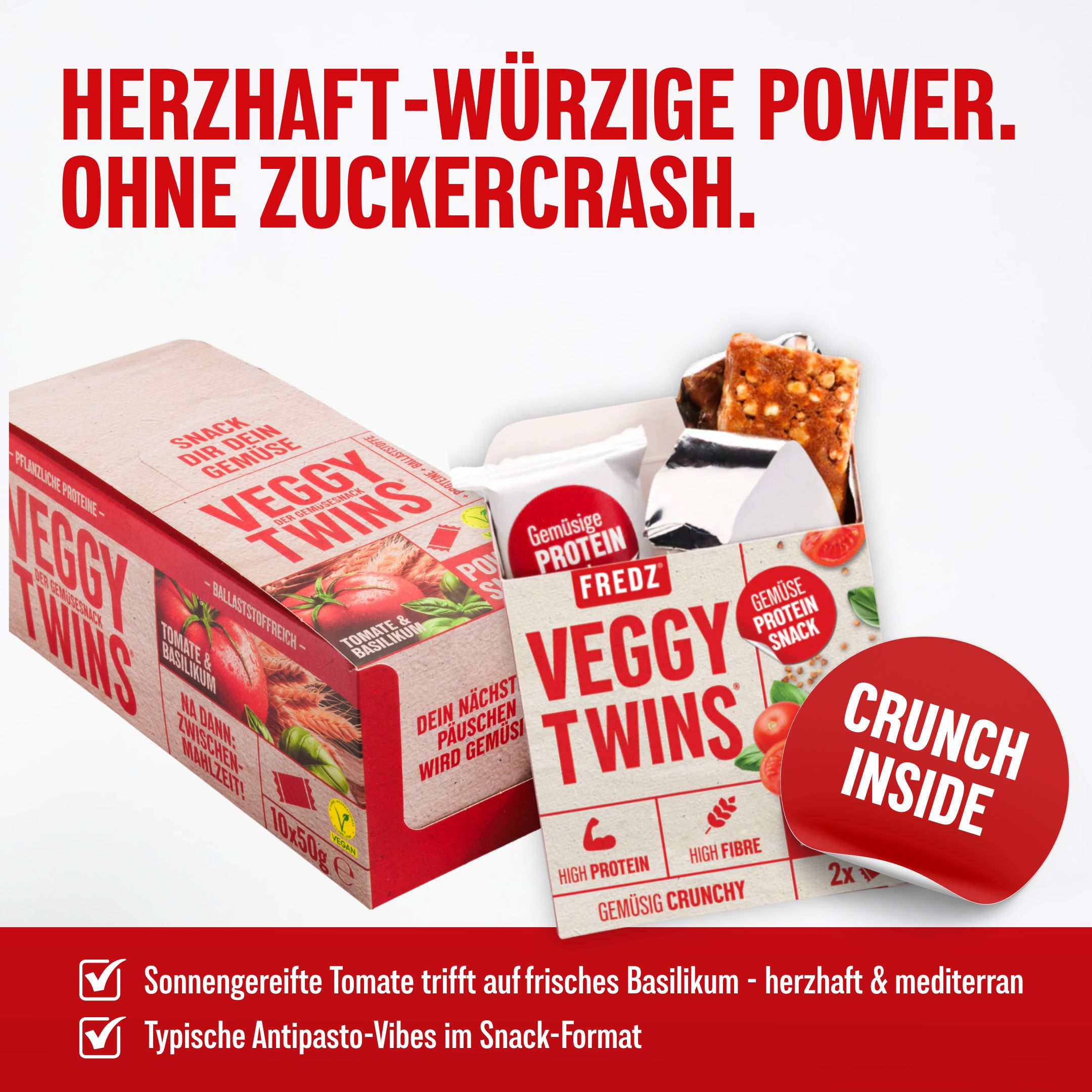 Verpackung mit FREDZ VeggyTwins®. Text: Herzhaft-würzige Power. Ohne Zuckercrash. Tomate & Basilikum. Crunch Inside.