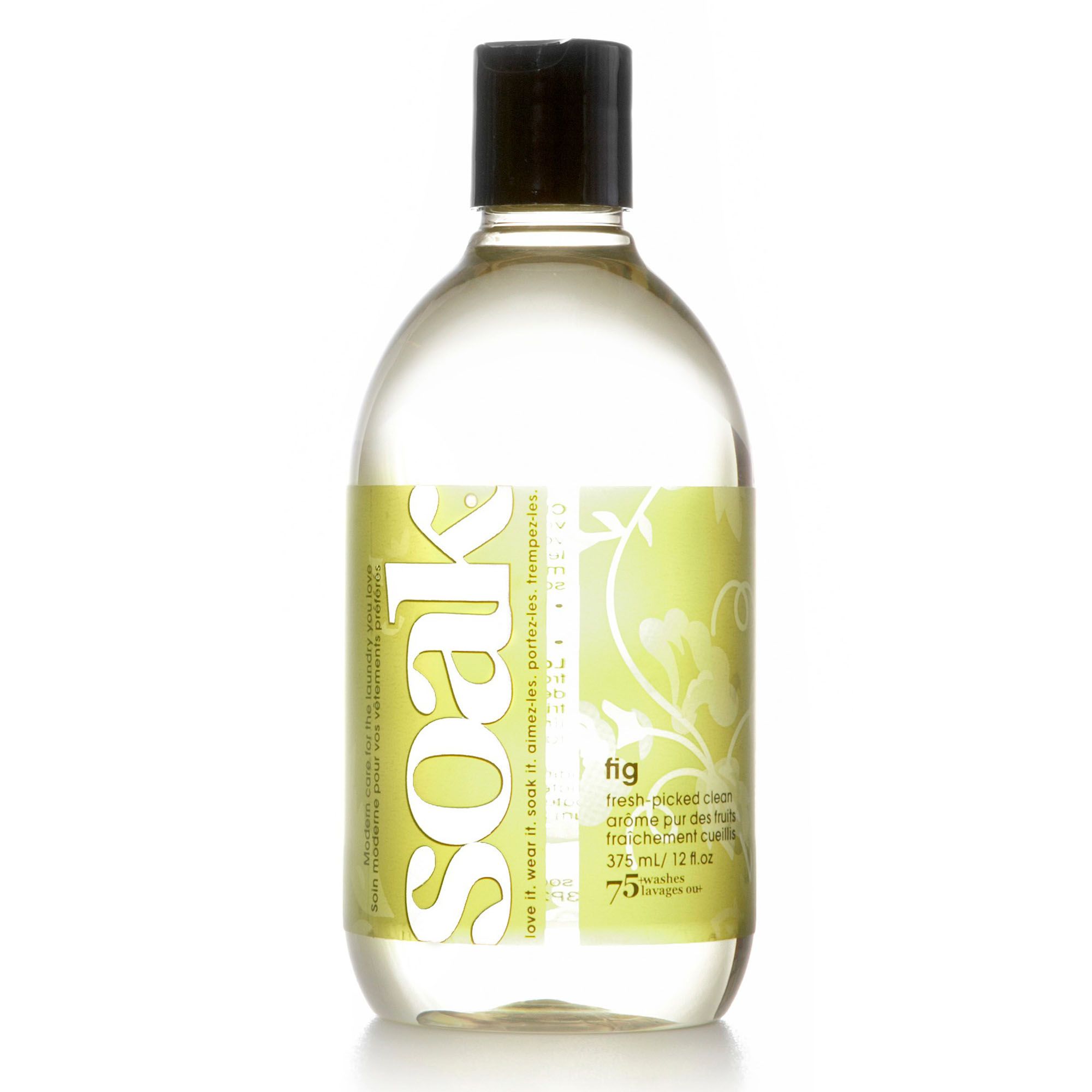 Klare Flasche mit schwarzem Deckel, gelbem Etikett mit "Soak" und "fig". Text: "fresh-picked clean".