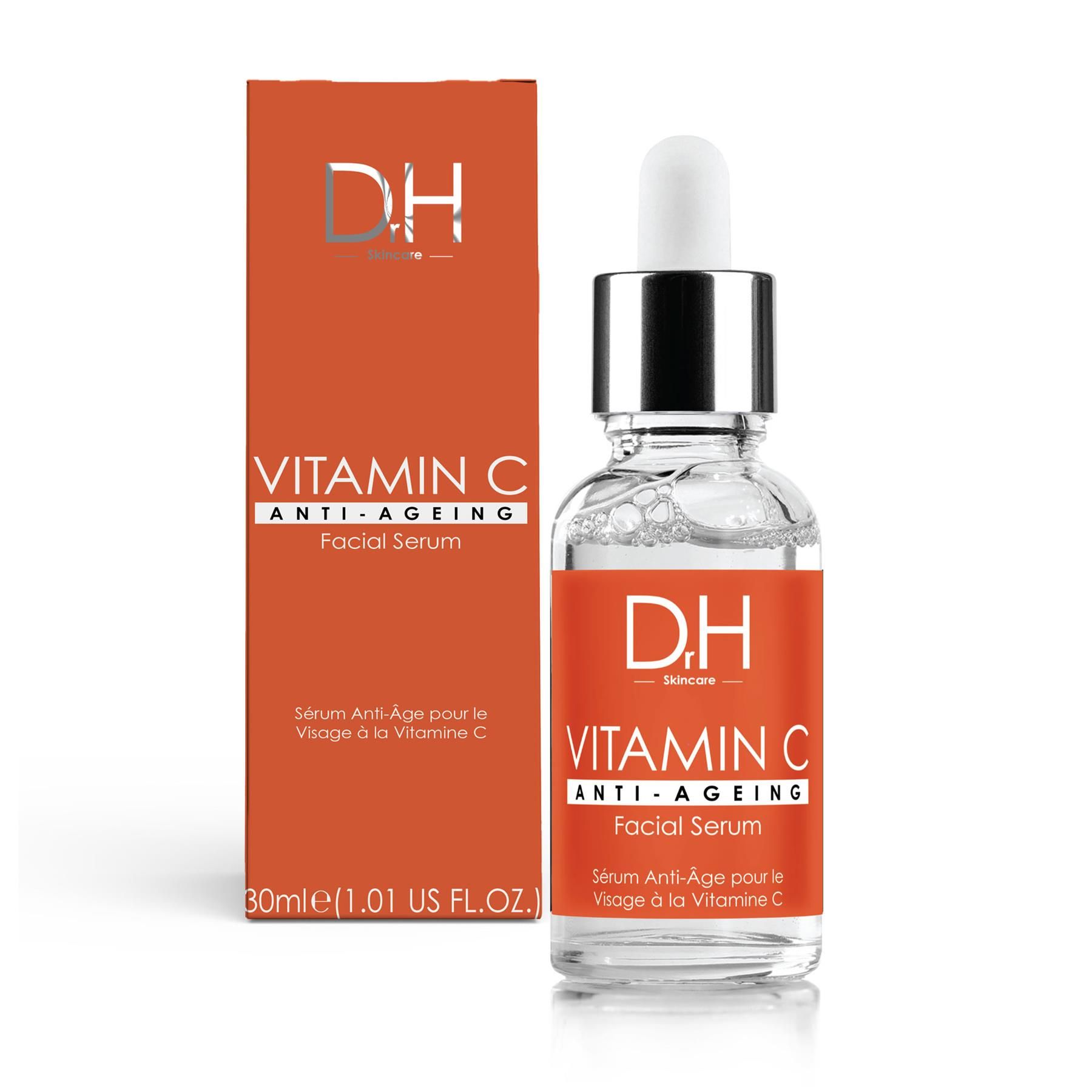 Dr H Anti-Aging Vitamin C Gesichtsserum in Glasflasche mit Pipette und orangefarbener Faltschachtel.