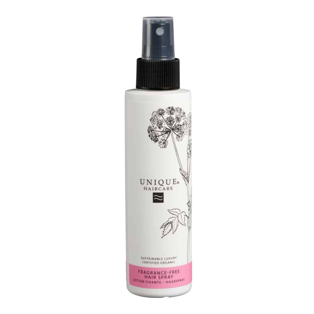 Weißes Haarspray mit schwarzem Sprühkopf. Aufschrift: UNIQUE Haircare, FRAGRANCE-FREE HAIR SPRAY. Mit floralem Muster.
