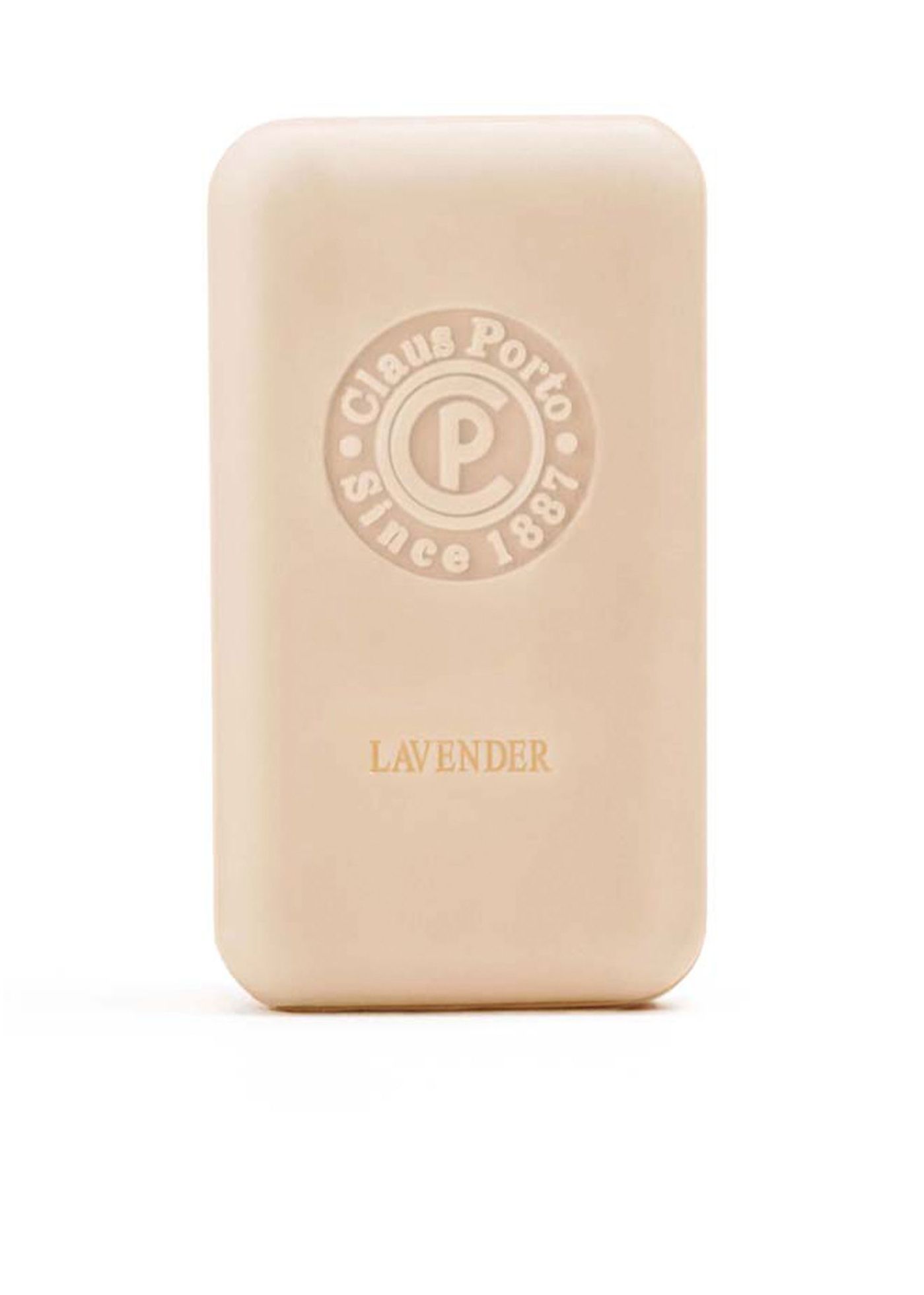 Beige Seife mit rundem Logo und Schriftzug "Claus Porto Since 1887". Unterhalb steht "LAVENDER".