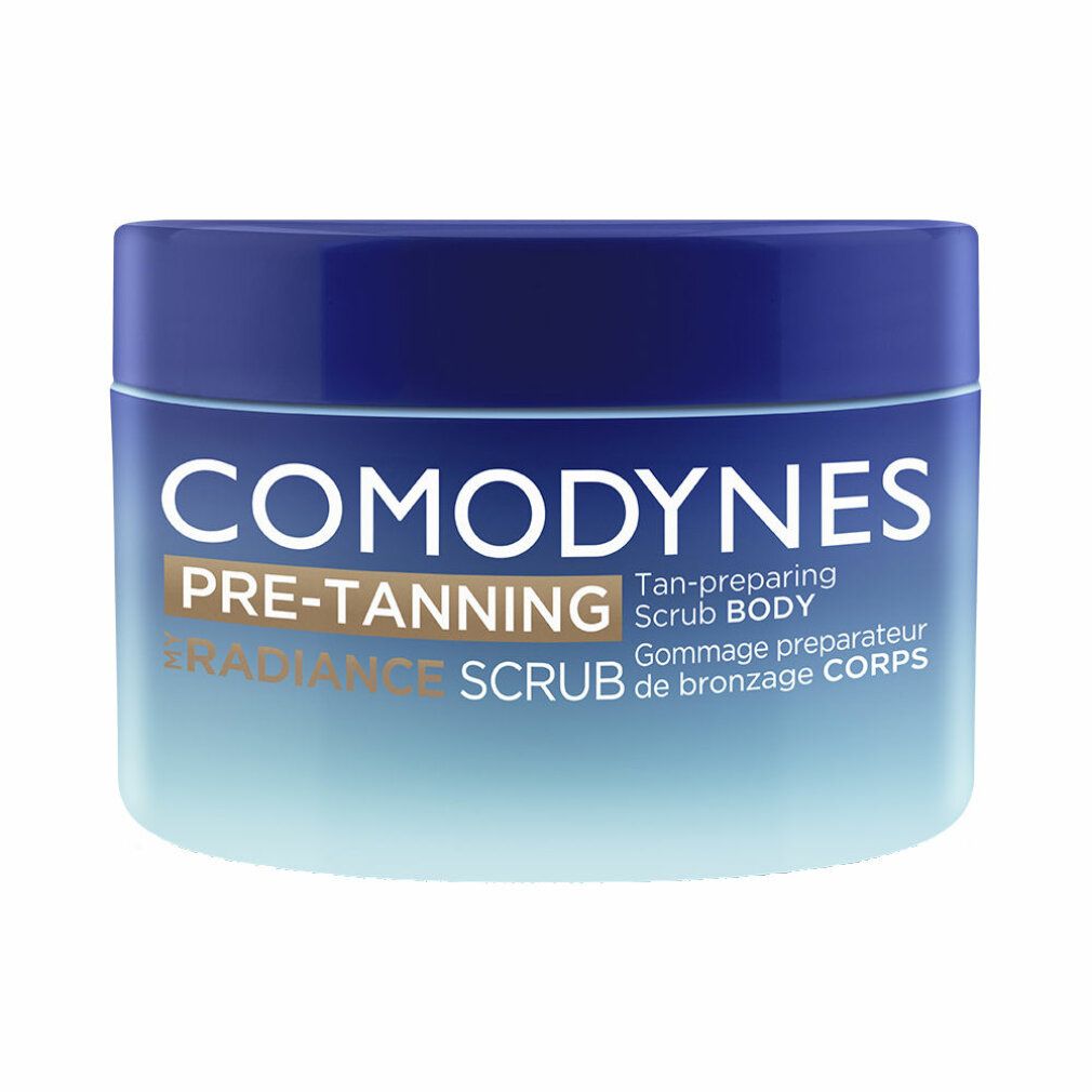 Blau-weißer Tiegel. Produktname: COMODYNES PRE-TANNING RADIANCE SCRUB BODY. Text auf dem Etikett.
