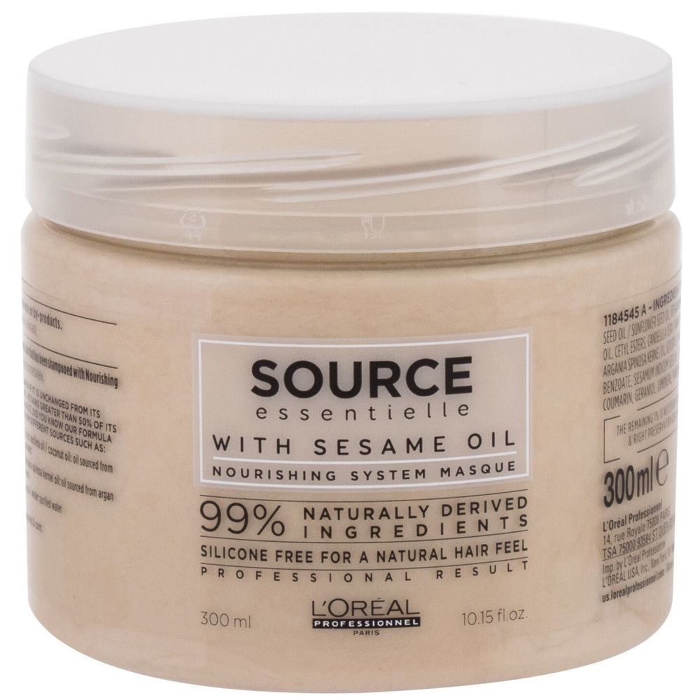 Beige Dose mit weißem Deckel. Aufschrift: Source Essentielle, mit Sesamöl, Nourishing System Masque. 300 ml. L'Oréal Professionnel.
