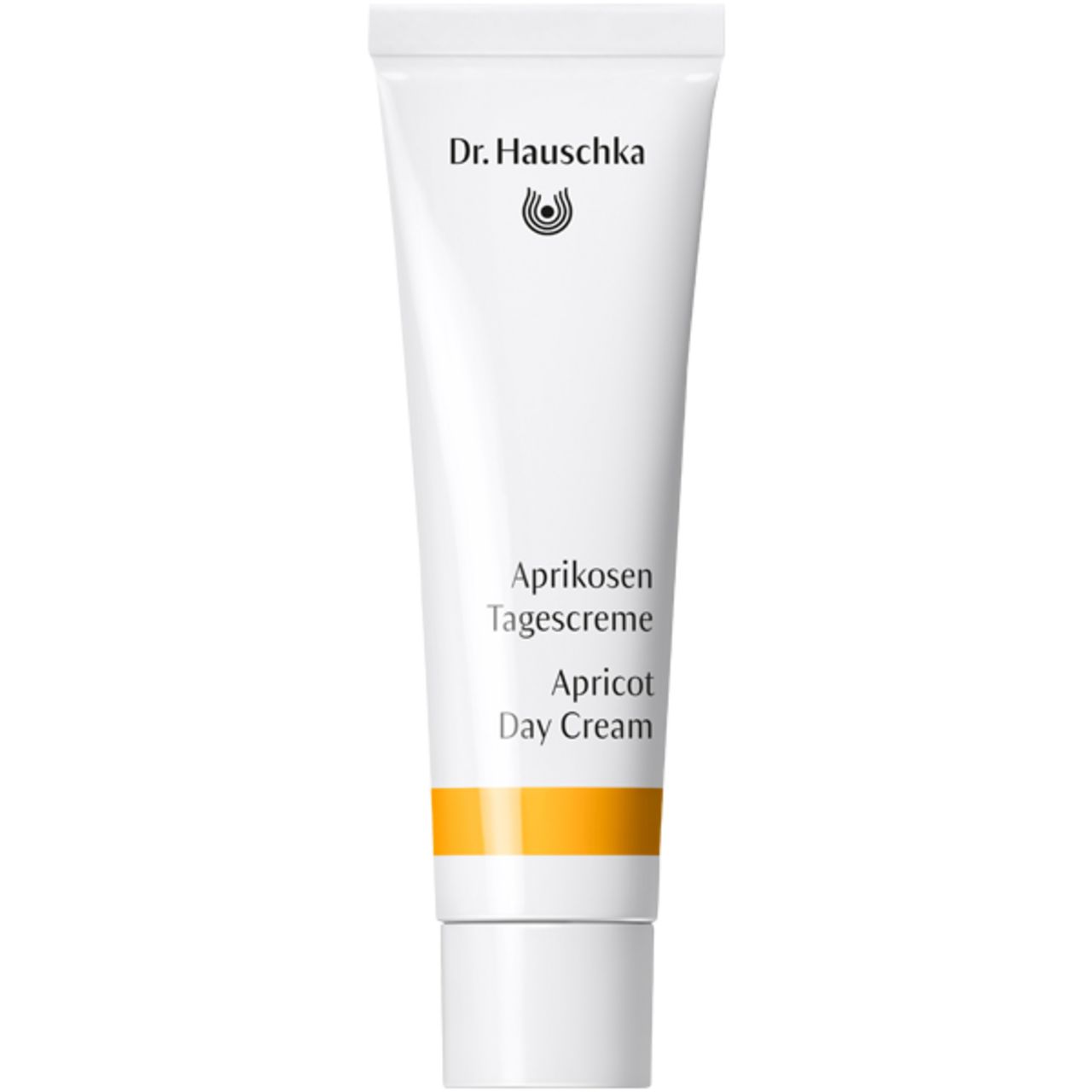 Dr. Hauschka Aprikosen Tagescreme in weißer Tube mit gelbem Streifen.