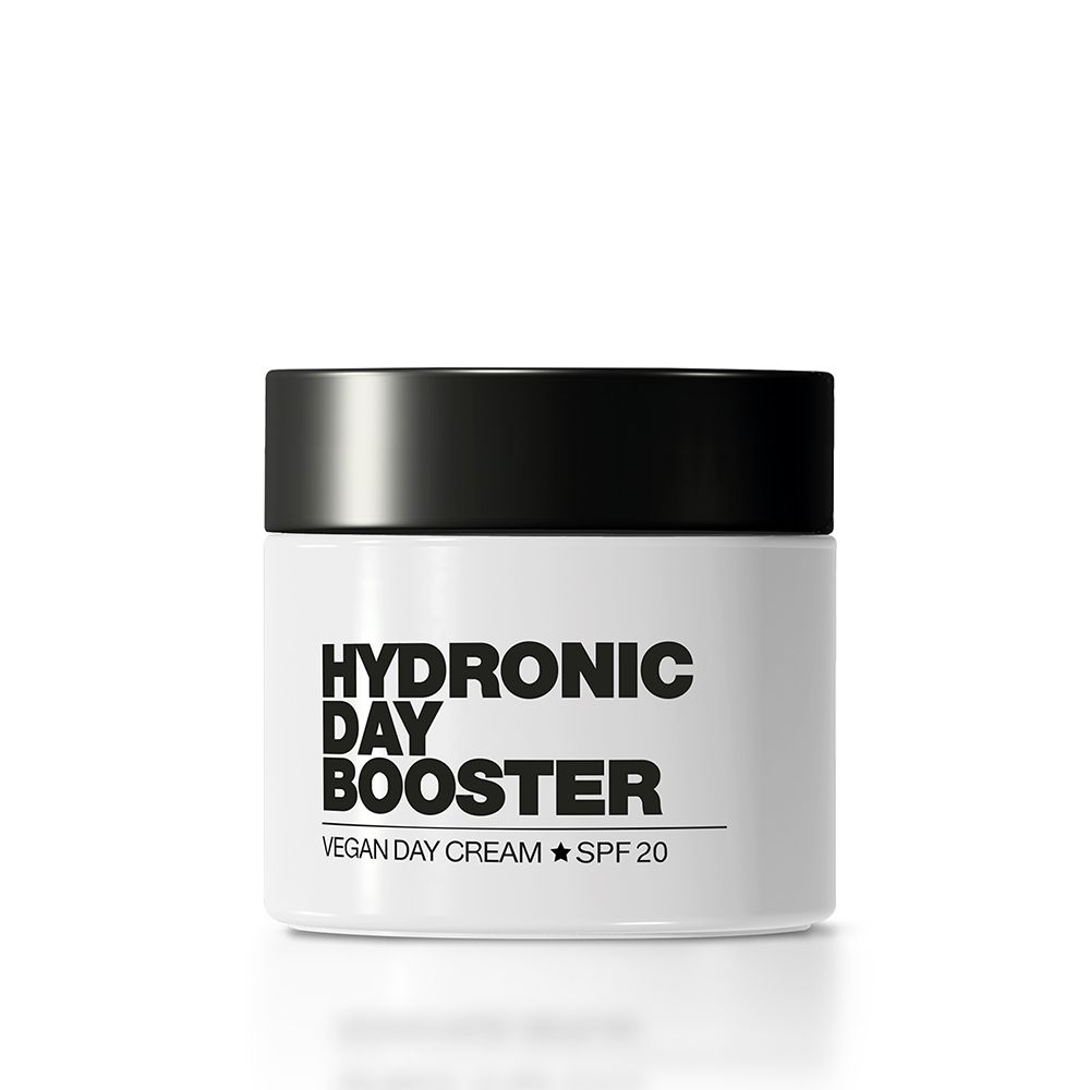 Weißer Tiegel mit schwarzem Deckel. Aufschrift: Hydronic Day Booster, Vegan Day Cream, SPF 20.