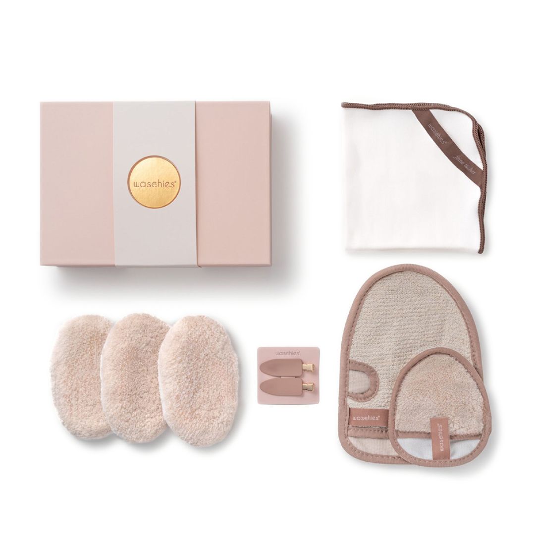 Geschenkset mit Waschies-Produkten: Pads, Handschuh, Handtuch, Haarklammern, Geschenkbox.