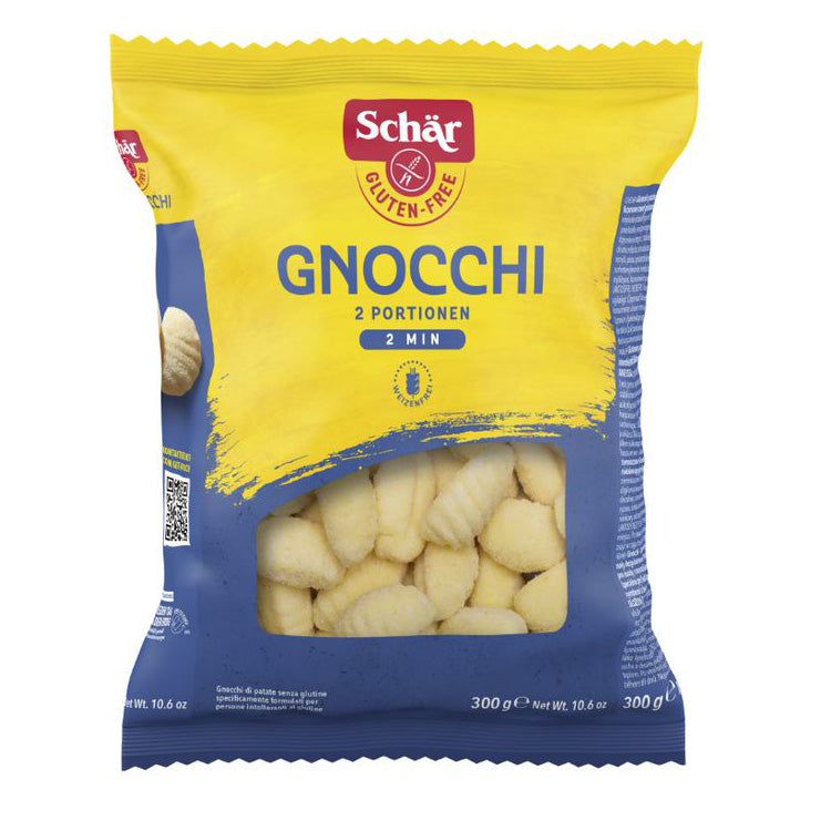 Verpackung mit Gnocchi. Gelbe und blaue Verpackung mit Produktnamen und glutenfreiem Logo. Sichtbare Gnocchi.