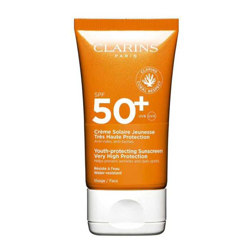 Orange Tube mit weißem Deckel. Text: Clarins Paris, SPF 50+, Crème Solaire Jeunesse, Très Haute Protection, Wasserfest.