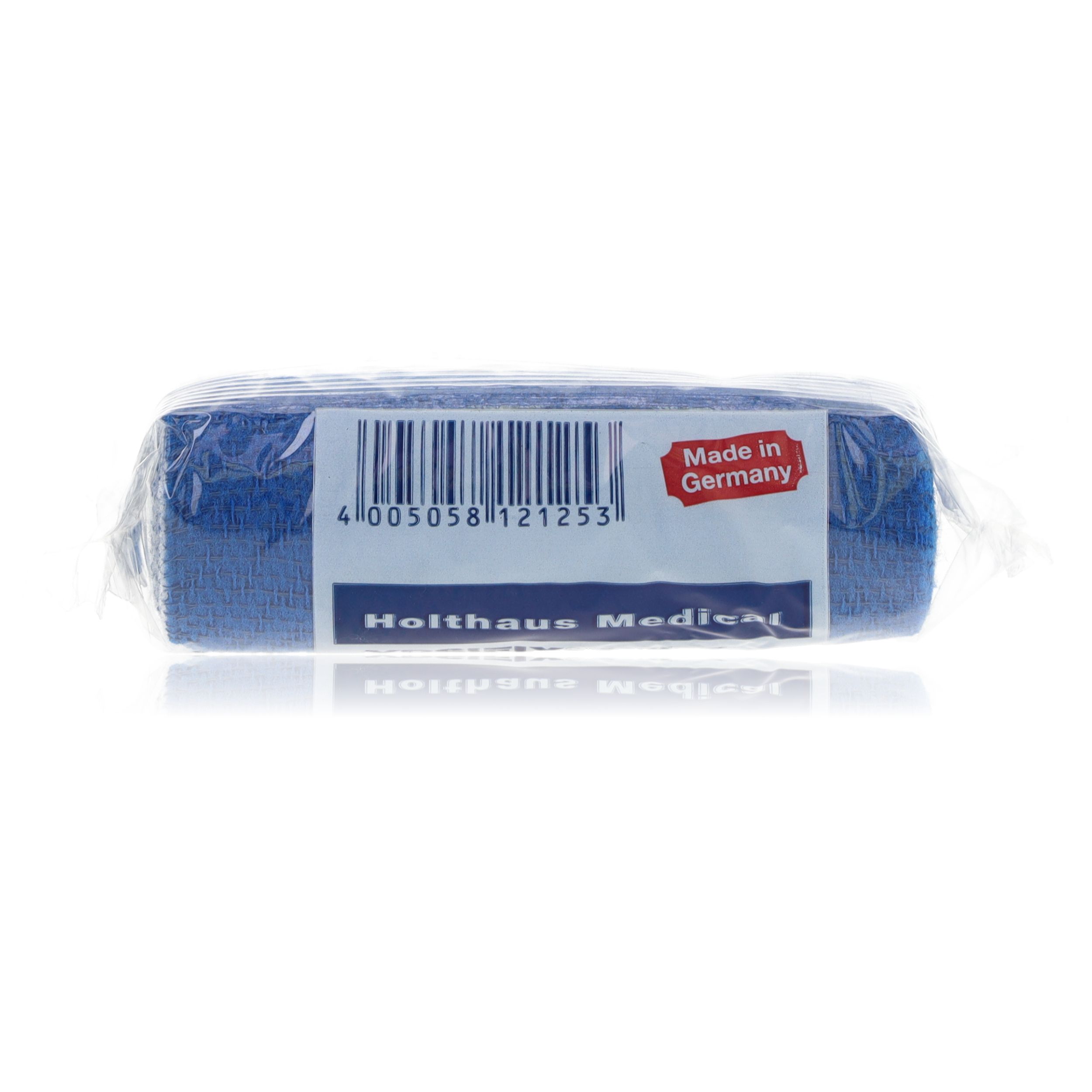 Blaues Fixierbinde-Rolle in Verpackung. Aufdruck: Made in Germany. Barcode und Hersteller Holthaus Medical.