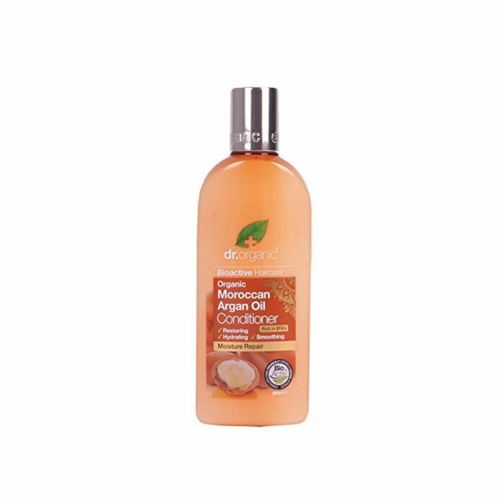 Flasche mit Conditioner. Aufschrift: Dr. Organic, Bioaktive Haarpflege, Moroccan Argan Oil Conditioner. Silberner Deckel.