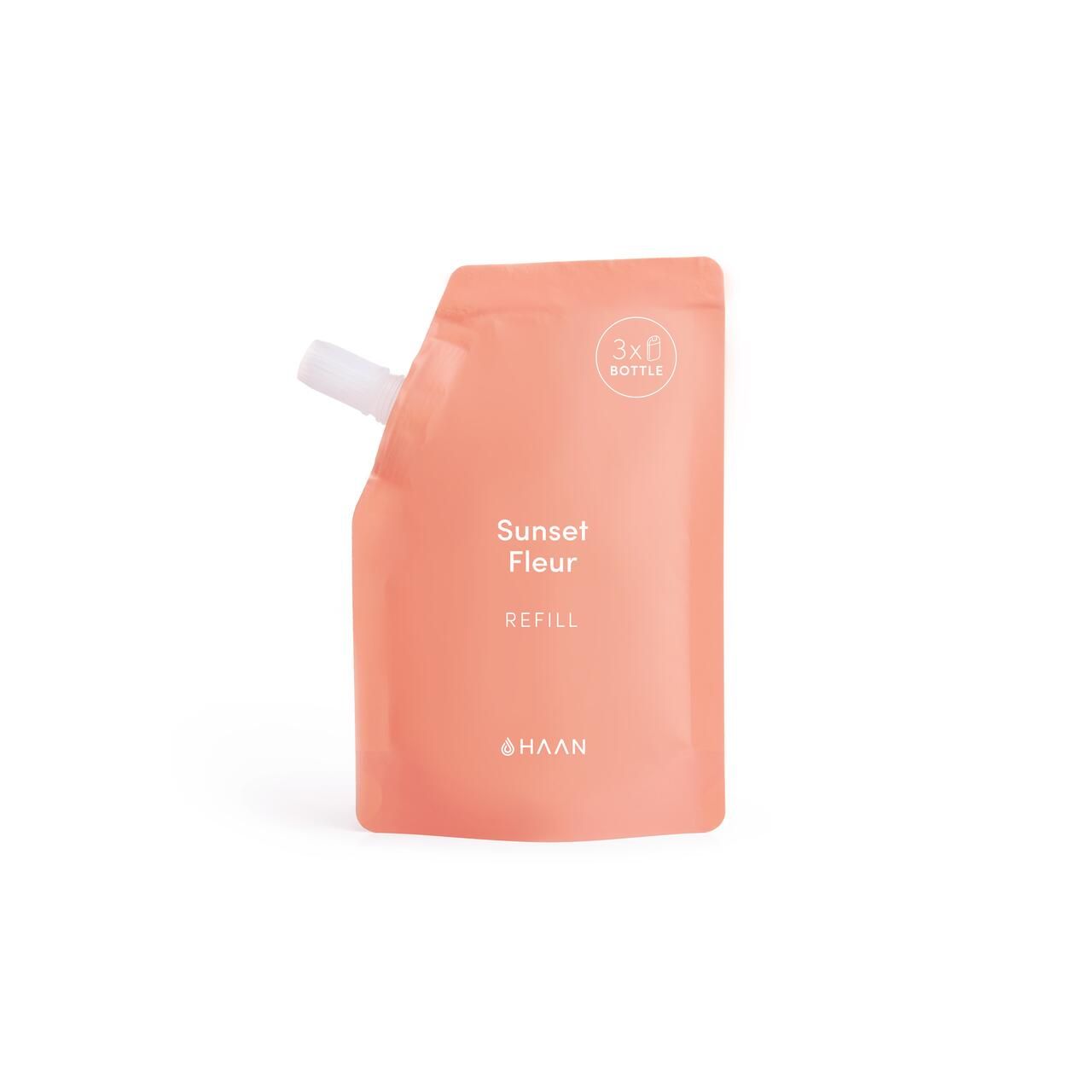 Nachfüllbeutel für Händedesinfektionsmittel. Rosa Beutel mit weißem Ausgießer. Aufschrift: Sunset Fleur, HAAN.