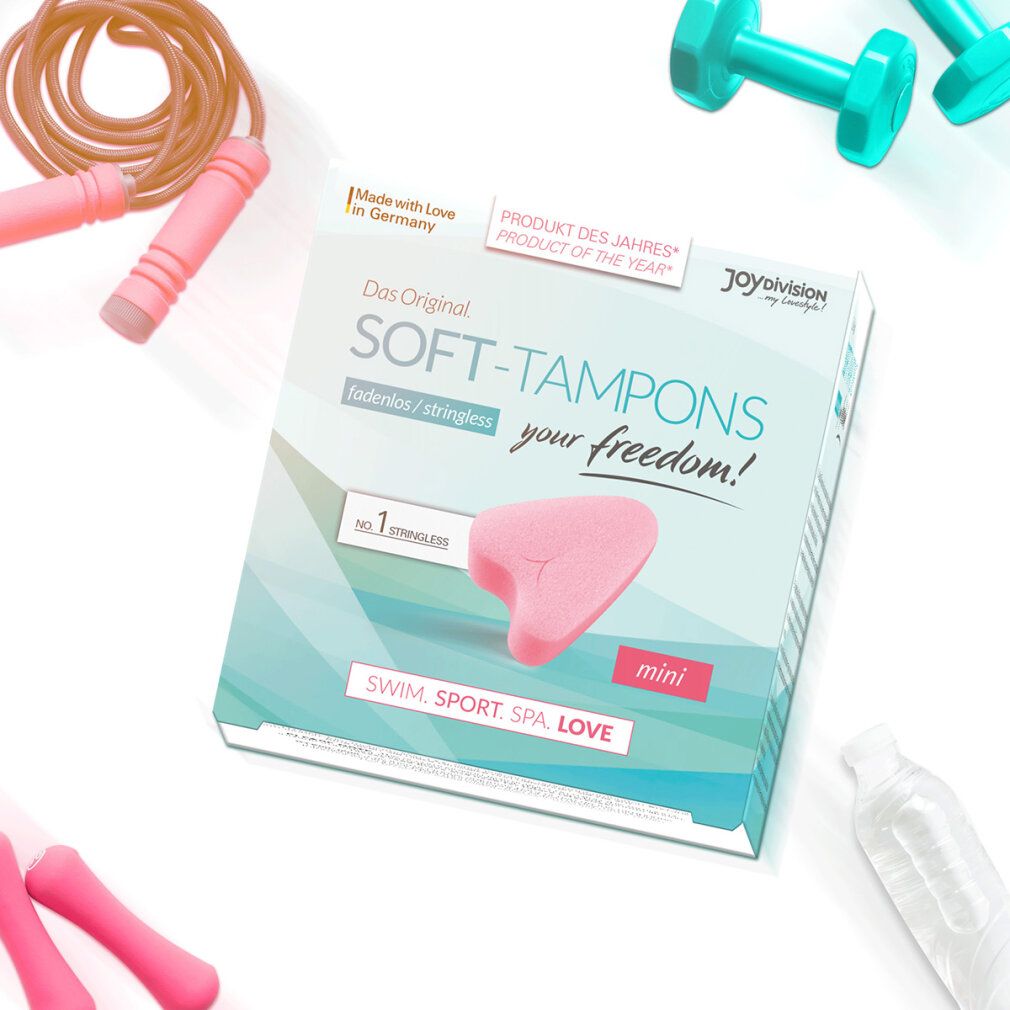Verpackung von Soft-Tampons mini. Türkis-farbener Karton mit Produkt- und Markenlogo. Rosa Tampon-Form abgebildet.
