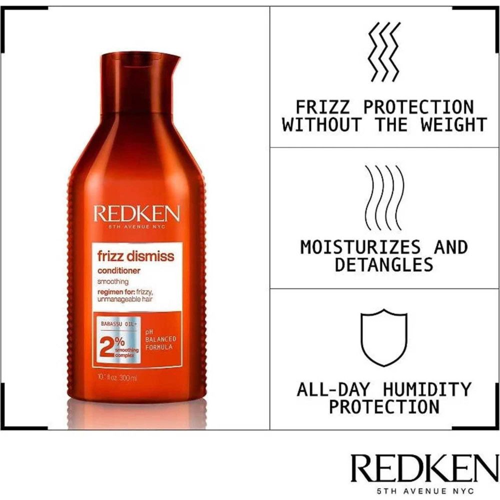 Rote Flasche mit Redken Frizz Dismiss Conditioner. Text: Frizzschutz, befeuchtet, entwirrt, schützt vor Feuchtigkeit.