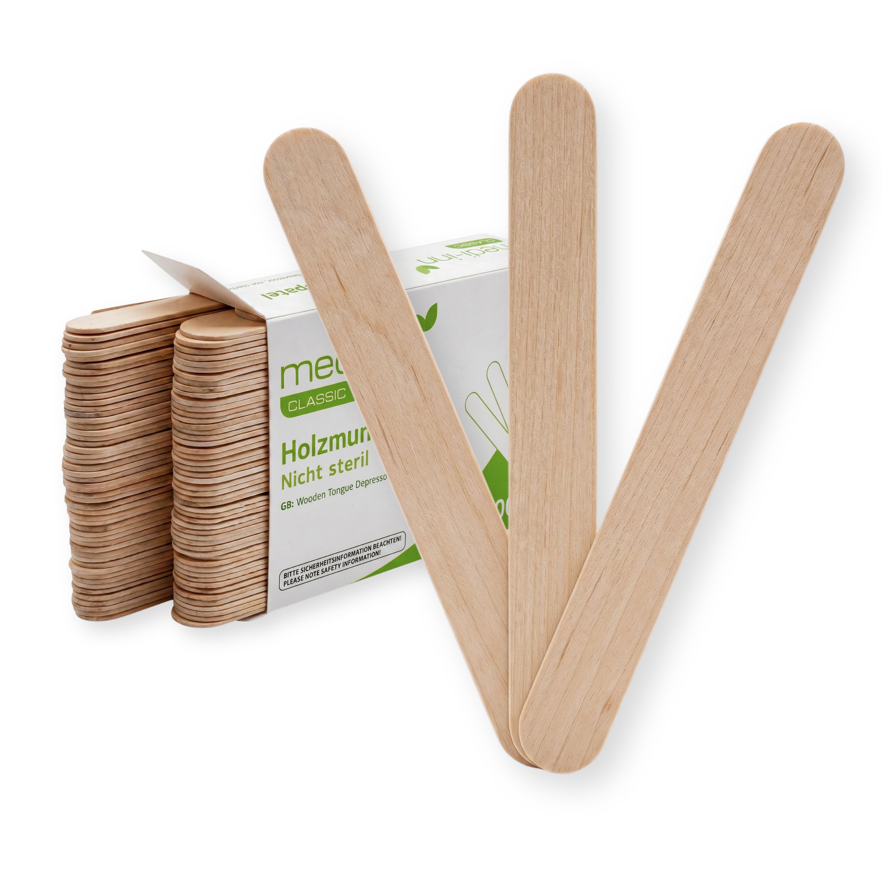 Eine geöffnete Packung Holzmundspatel, daneben drei einzelne Spatel.