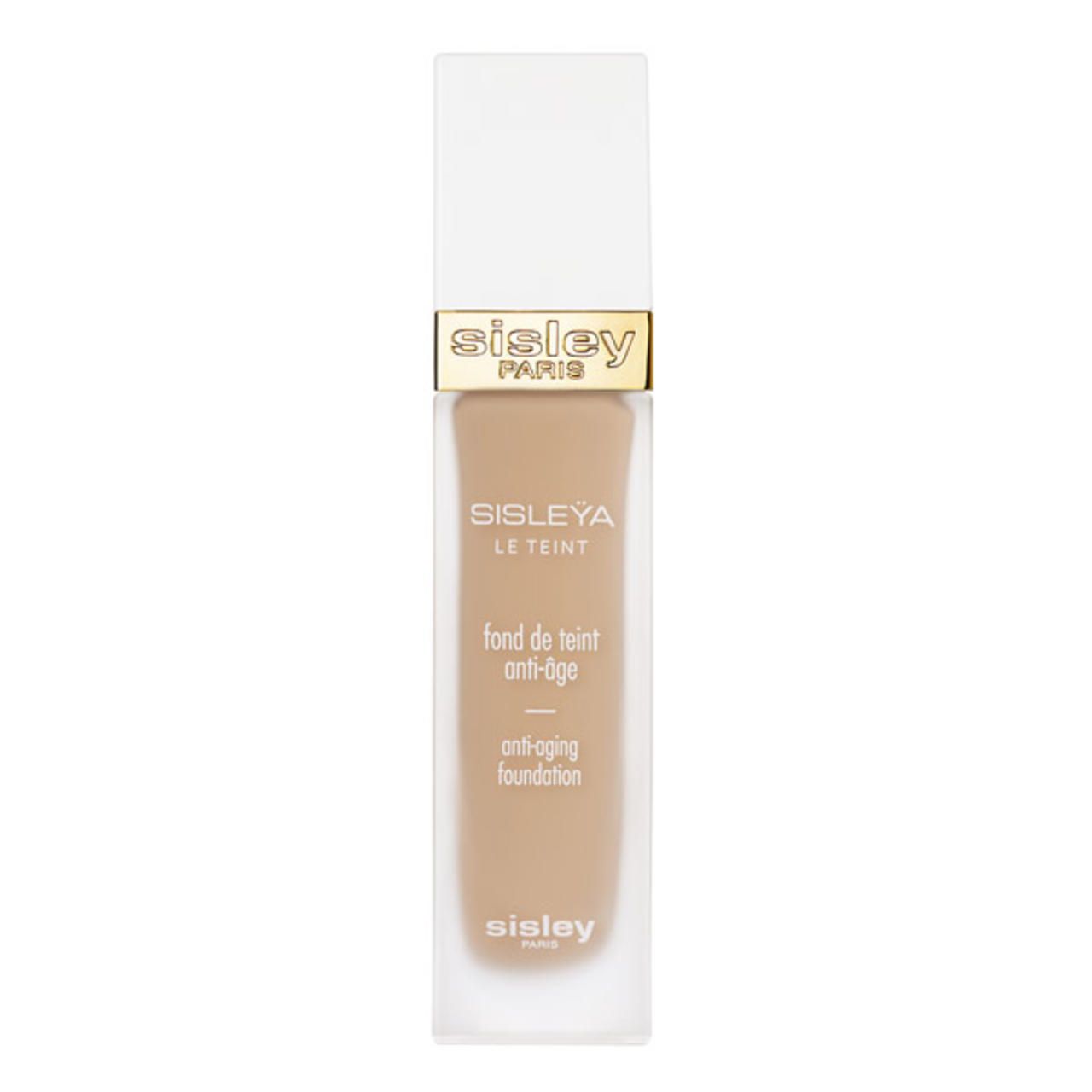 Sisley Sisleya Le Teint. Flakon mit beiger Foundation, weißer Deckel. Goldener Schriftzug. Anti-Aging-Foundation.