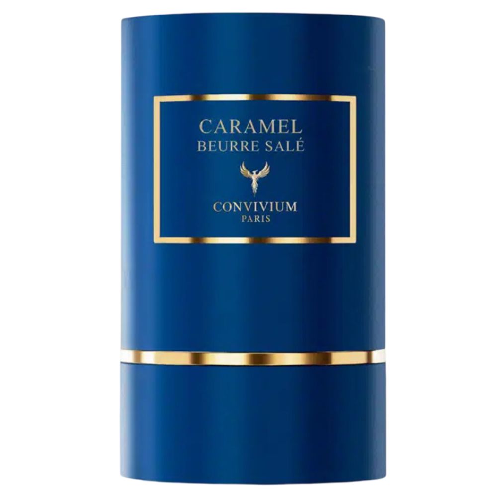 Zylindrische blaue Verpackung mit goldfarbenen Akzenten. Aufschrift "CARAMEL BEURRE SALÉ" und "CONVIVIUM PARIS".