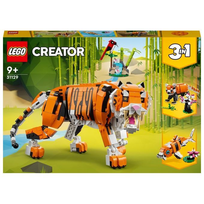 Set LEGO Creator 3 in 1 con una maestosa tigre. Il set include mattoncini per costruire una tigre, un pesce e un uccello rosso. La confezione mostra la tigre in un ambiente giungla. Adatto a bambini dai 9 anni in su.