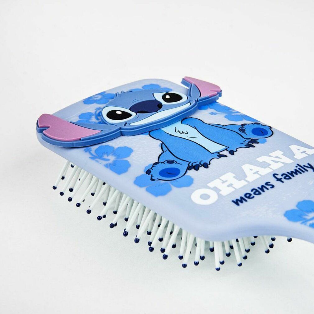 Haarbürste mit Stitch-Motiv. Hellblau, quadratischer Bürstenkopf. Stitch-Figur und Schriftzug "Ohana means family" auf der Rückseite.