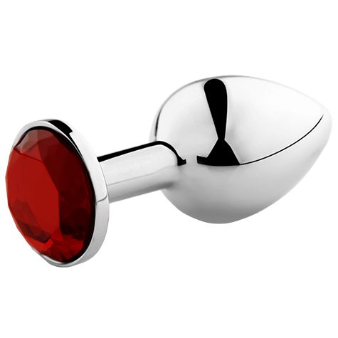 Analplug aus Metall mit rotem Schmuckstein. Glänzende Oberfläche, konische Form. Runde Basis mit Stein.