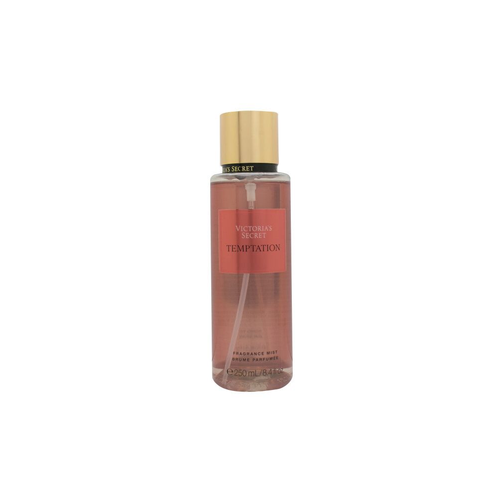 Victoria's Secret Temptation Körperspray. Transparente Flasche, goldener Deckel, Sprühkopf.