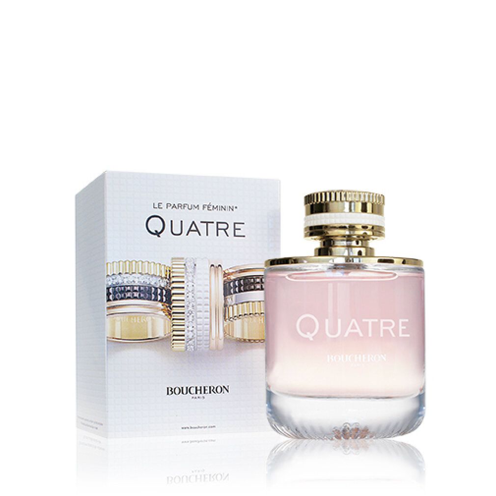 Parfümflakon und Verpackung. Aufschrift: Quatre, Boucheron. Abbildung von Ringen. Rosa Flüssigkeit.